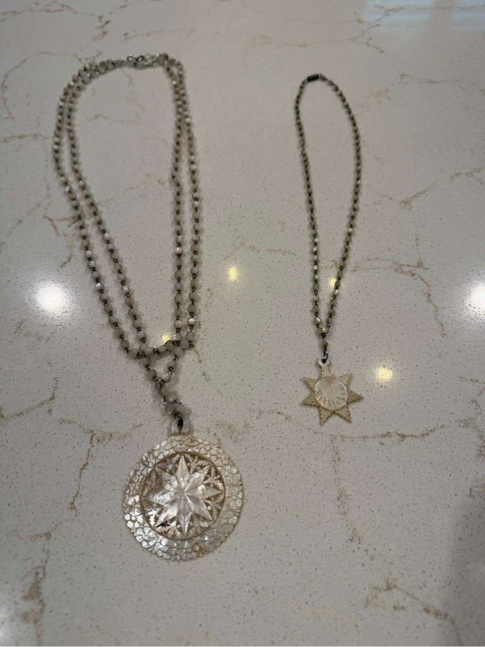 Two Bethlehem hand-carved Mother of Pearl Pendant Necklaces